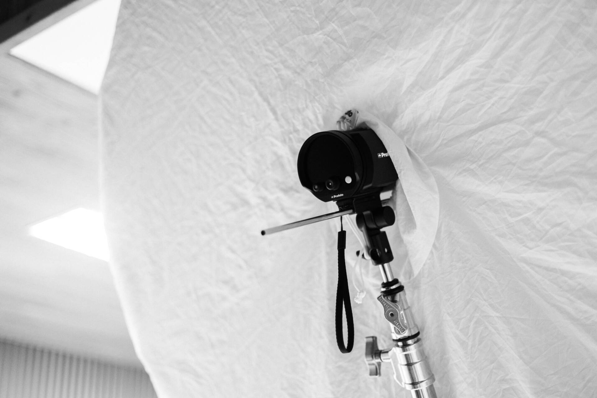 A professional studio setup with a light reflector fabric and a camera mounted on a stand - Tokyo Portrait Photographer